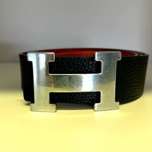 Hermès  Reversible black & orange belt.